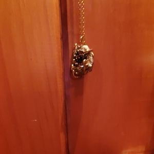 Gold stone pendant